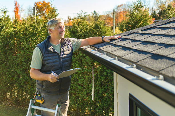 Professional Storm Damage Roof Repair technician working in Mammoth Cave, KY
